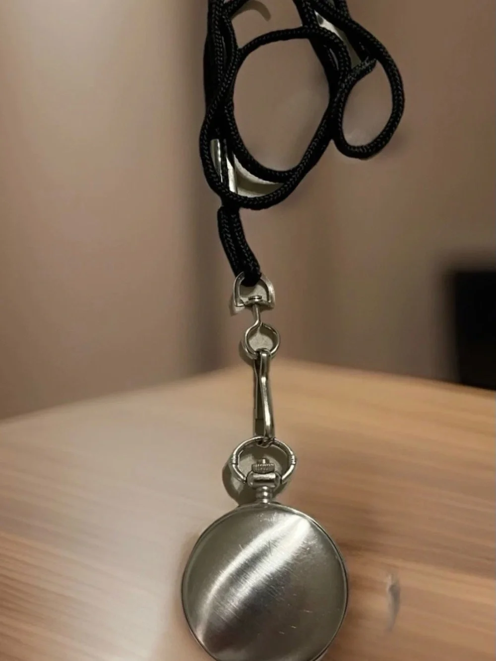 Silver-tone Pocket Watch Pendant with Train Illustration